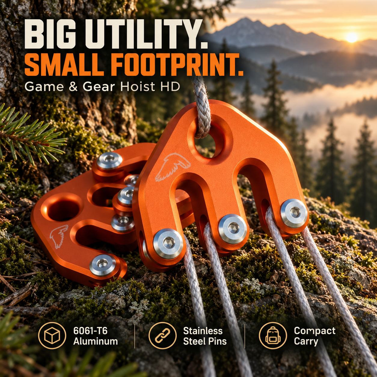 Orange aluminum block-and-tackle hardware displayed outdoors