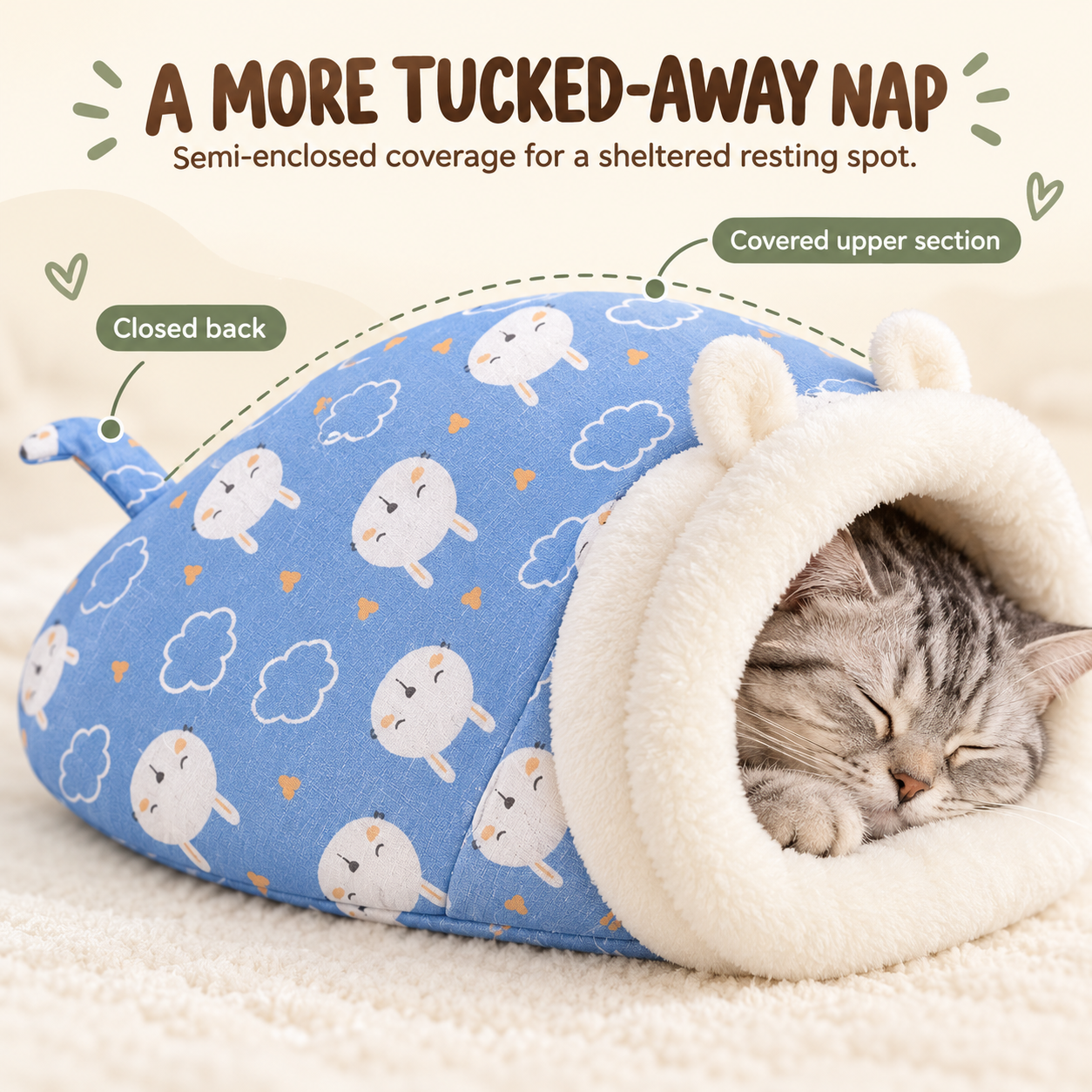 Tabby kitten sleeping inside blue semi-enclosed cave bed with covered upper section and closed back