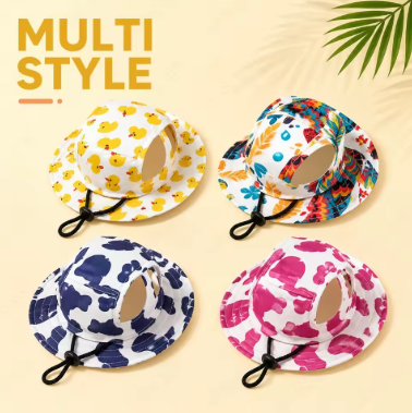 Four LaunchPaw dog hat styles including Ducks, Tropical, Navy Splat and Pink Splat
