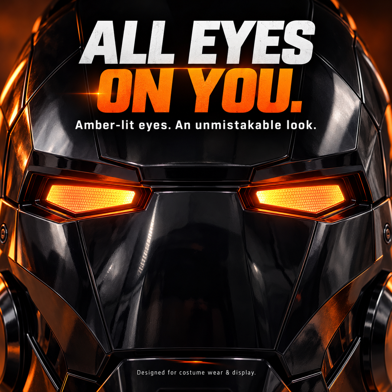 Front close-up of armored costume helmet with two glowing amber LED eyes