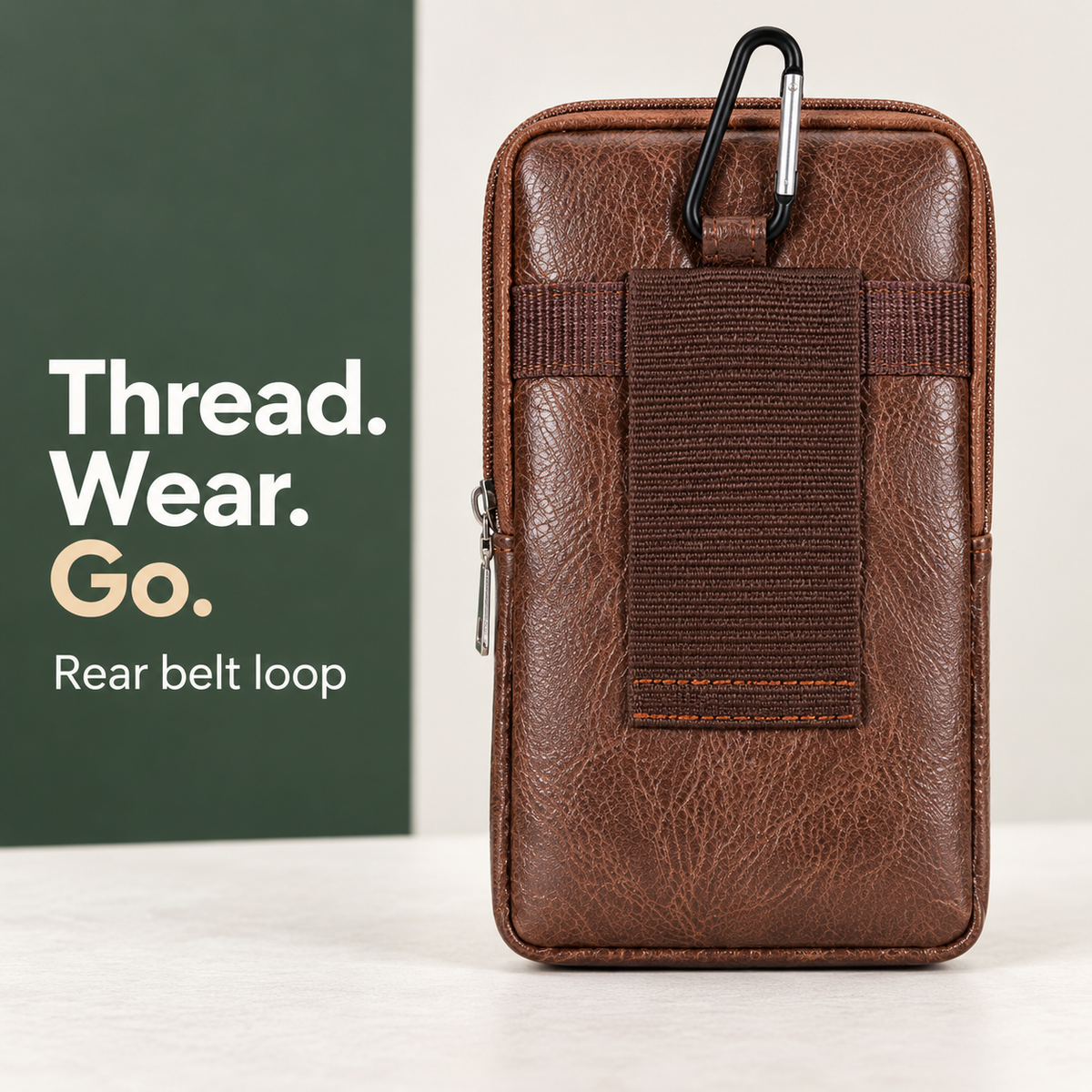 Rear belt loop on brown phone pouch