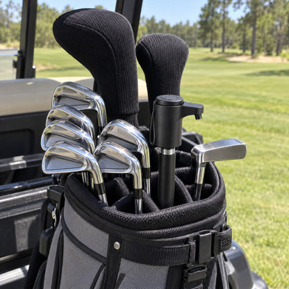 FIFTH IRON standing among the irons in a golf bag