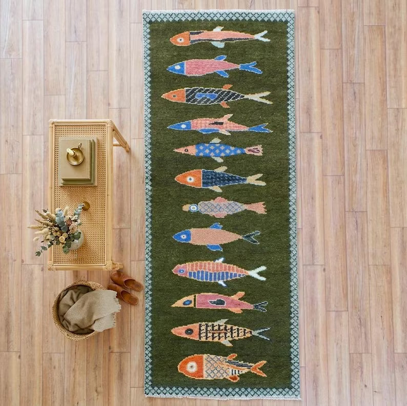Top-down view of full koi fish runner rug showing the long rectangular shape colorful fish and decorative border