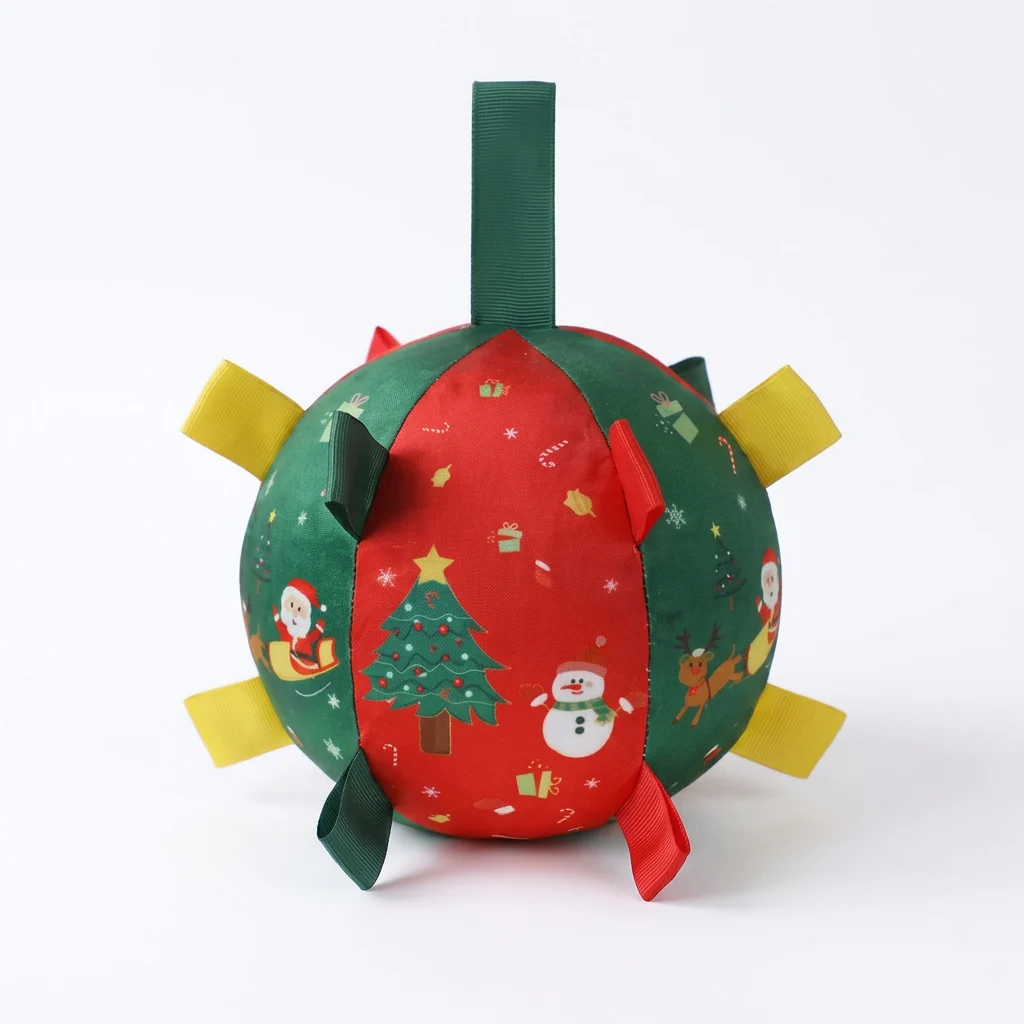 Actual Christmas bounce ball product with red green holiday print and colorful fabric loops